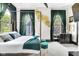 This bedroom features a four poster bed, and multiple windows draped in deep green at 543 Fletcher Ave, Indianapolis, IN 46203