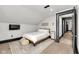 Bright bedroom with a full bed, stylish decor, and hardwood floors at 543 Fletcher Ave, Indianapolis, IN 46203