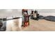 Spacious game room area featuring classic arcade games and wood floor at 543 Fletcher Ave, Indianapolis, IN 46203