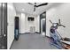 Spacious home gym features black trim, workout equipment, and ample open space for activities at 543 Fletcher Ave, Indianapolis, IN 46203