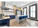 Modern kitchen features a large island, stainless steel appliances, and ample natural light at 543 Fletcher Ave, Indianapolis, IN 46203