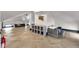 Bright recreation room featuring ample space, herringbone floors, and comfortable sofas at 543 Fletcher Ave, Indianapolis, IN 46203