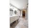 Bathroom featuring a double sink vanity, vanity lighting, and tile flooring at 5522 Grassy Bank Dr, Indianapolis, IN 46237