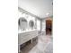 Bathroom featuring a double sink vanity, vanity lighting, and tile flooring at 5522 Grassy Bank Dr, Indianapolis, IN 46237