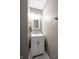 A powder room featuring a vanity and simple mirror at 5522 Grassy Bank Dr, Indianapolis, IN 46237