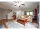 Bright living room with hardwood floors, comfortable seating, and natural light at 5522 Grassy Bank Dr, Indianapolis, IN 46237