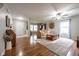 Spacious living room featuring hardwood floors, area rug, and bright natural light at 5522 Grassy Bank Dr, Indianapolis, IN 46237