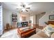 Inviting living room featuring hardwood floors, open layout, and stylish decor at 5522 Grassy Bank Dr, Indianapolis, IN 46237