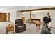 Finished basement featuring a lounge area, game area and exercise equipment for entertaining at 5523 Gainesway Dr, Greenwood, IN 46142