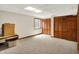Large basement with new carpet, a window for natural light, and closet for storage at 5523 Gainesway Dr, Greenwood, IN 46142