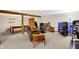 Large basement with a lounge, game table, work out equipment and storage for multiple purposes at 5523 Gainesway Dr, Greenwood, IN 46142