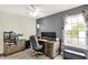 Office space with desk, carpet, ceiling fan and neutral color scheme at 5523 Gainesway Dr, Greenwood, IN 46142