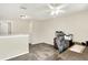 Open office space with carpeted floors, a desk, and a ceiling fan with lights at 5523 Gainesway Dr, Greenwood, IN 46142