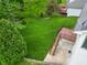 Aerial view of backyard with deck and mature trees at 6039 Chinkapin Dr, Columbus, IN 47201