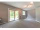 Finished basement with sliding door and a window for natural light at 6039 Chinkapin Dr, Columbus, IN 47201