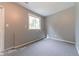 Finished basement featuring gray carpeting and natural light from the single window at 6039 Chinkapin Dr, Columbus, IN 47201