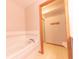 Bright bathroom featuring a soaking tub and separate shower, offering a relaxing spa-like experience at 6039 Chinkapin Dr, Columbus, IN 47201