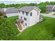 Exterior of home with deck, stairs, and large lawn at 6039 Chinkapin Dr, Columbus, IN 47201
