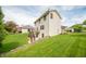 Exterior shot featuring walkout basement, deck, and yard at 6039 Chinkapin Dr, Columbus, IN 47201