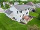 Rear exterior showing deck and patio at 6039 Chinkapin Dr, Columbus, IN 47201
