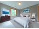 Comfortable primary bedroom with elegant decor, a large window, and neutral tones at 6039 Chinkapin Dr, Columbus, IN 47201