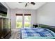 Comfortable bedroom with abundant natural light, neutral paint and ample closet space at 6212 N Woods Edge Dr, McCordsville, IN 46055