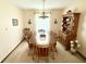 Elegant dining room featuring a wooden table with seating for eight and classic decor at 641 Lawndale Dr, Plainfield, IN 46168