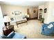 Spacious living room with plush carpet, classic furnishings, and neutral decor at 641 Lawndale Dr, Plainfield, IN 46168