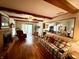 Comfortable living area with hardwood floors, fireplace, and seamless flow to outdoor space at 641 Lawndale Dr, Plainfield, IN 46168