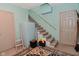 Basement with carpeted stairs, a neutral color scheme, and convenient access to the upper floors at 6567 Kings Ct, Avon, IN 46123