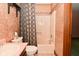 Bathroom with a shower and bathtub combo, toilet, and sink at 6567 Kings Ct, Avon, IN 46123