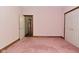 Bedroom showcasing carpeted flooring, a closet, and natural light at 6567 Kings Ct, Avon, IN 46123