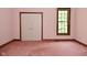 Bedroom featuring pink carpet, natural light and neutral walls at 6567 Kings Ct, Avon, IN 46123