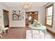 Dining room featuring wood trim and a vintage chandelier at 6567 Kings Ct, Avon, IN 46123