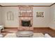 Living room view showcasing brick fireplace and mantel at 6567 Kings Ct, Avon, IN 46123