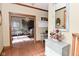 Foyer with hardwood floors and view of dining room at 6567 Kings Ct, Avon, IN 46123