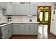 Kitchen with gray cabinets, white countertops, and stainless-steel sink at 6567 Kings Ct, Avon, IN 46123