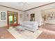 Inviting living room with hardwood floors, a neutral couch, and stylish decor at 6567 Kings Ct, Avon, IN 46123