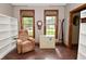 Spacious office features two large windows, built-in shelving, and natural light at 6567 Kings Ct, Avon, IN 46123