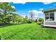 Green lawn and a privacy fence running along the side of the backyard at 7248 River Birch Ln, Indianapolis, IN 46236