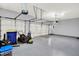 Spacious garage with epoxy flooring, providing ample space for parking and storage at 7248 River Birch Ln, Indianapolis, IN 46236