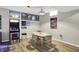 Spacious living room with an arcade game, a dining table and recessed lighting at 7248 River Birch Ln, Indianapolis, IN 46236