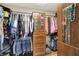 Custom walk-in closet featuring hardwood floors and custom shelving and cabinets at 7248 River Birch Ln, Indianapolis, IN 46236