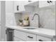 Updated kitchen featuring stainless steel appliances, white cabinets, and white countertops at 8120 E 11Th St, Indianapolis, IN 46219