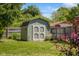 Backyard with a convenient storage shed at 8120 E 11Th St, Indianapolis, IN 46219