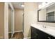 Clean bathroom with a glass shower and modern vanity at 813 Stoner Dr, Anderson, IN 46013