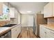 Updated kitchen featuring stainless steel appliances and white cabinetry at 813 Stoner Dr, Anderson, IN 46013