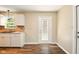 Charming kitchen showcasing granite countertops and a bright window at 813 Stoner Dr, Anderson, IN 46013