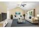 Bright, staged living room with vaulted ceilings and stylish furnishings, creating a cozy and inviting atmosphere at 813 Stoner Dr, Anderson, IN 46013