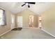 Inviting living room featuring neutral paint and a ceiling fan at 813 Stoner Dr, Anderson, IN 46013